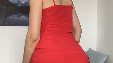 striptease in a red dress