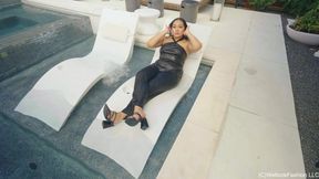 Tina Takes a Dip in the Pool Wearing a Shiny Jumpsuit