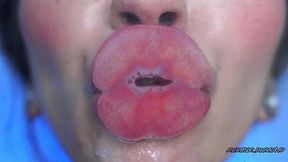 intimate close-up clear lipgloss spitting kiss