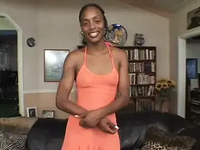 Horny ebony babe sits on a big white cock and rides it hard.