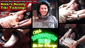 Nikki's Reality Tiki Tickle! - 720P at Otto's Shrunken Head in NYC, Nikki is tickled in the bar and put into foot stocks as she has her feet and armpits tickled in this public bar!