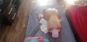 Sensual massage of a hot couple with oil on the body. Foreplay in the bedroom with an amateur couple.