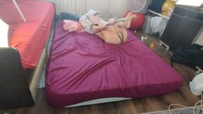 The sensual massage of a sexy couple with oil on the body. Foreplay in the bedroom with an amateur couple.