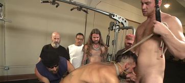 A group of people watches while gym perverts go hard