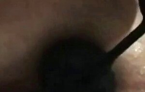 Anal beads and artificial cum inserted in asshole