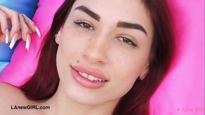 Red haired model shows her sexy body