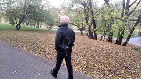 a mature woman with a camera walks about the park, and no one even guesses that she is a famous whore .!. ))