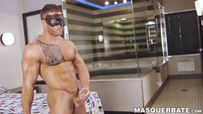 ”Masked muscular Devon Dexx strips slowly & masturbates”