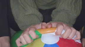 Playing, Squeezing & Tearing a Mini Beach Ball