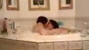 My brunette honey and her girl friend having fun in bathtub