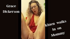 Kitten walks in on step Mommy