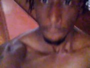 Black man walking naked in public at work