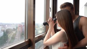 The Hot Bodies of a Young Couple Joined in Hot Passionate Sex on a Balcony Overlooking the City