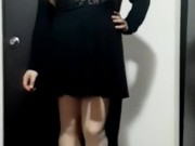 Cute crossdresser wearing dress and heels