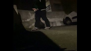 Amateur boy pissing in the street after party