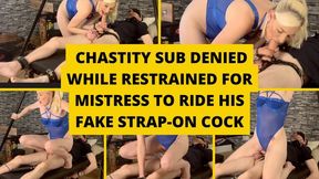 Chastity sub denied while restrained for mistress to ride his fake strap-on cock