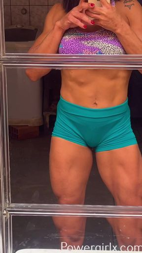 Naked female bodybuilder topless flexing