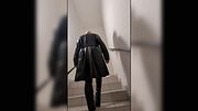 Public walk in overknee boots in a parkhouse, dressed in stockings, red pvc dress and leather coat. Hot blonde.