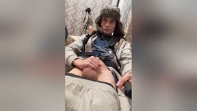 A Guy In A Winter Hat With Earflaps And A Blue Jacket, Masturbates His Penis And Cums With Hot Sperm