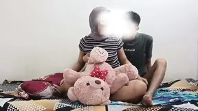 Indonesian woman in hijab exposes her wet pussy for real homemade sex
