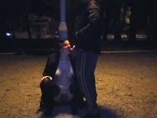 A piss slut wife drinks a piss in a public park