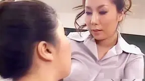 An Alluring Asian Woman with a Strap Impresses with a Sultry Chair Display: Watch Her