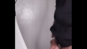 urinating and masturbating in a public Toilette