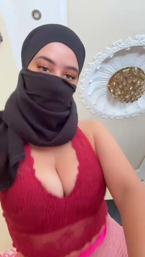 Naughty muslim slut in hijab slowly lifts her top to reveal her soft titties and perky arab boobs on cam