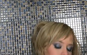 Blue Angel in high heels only masturbates in public toilet