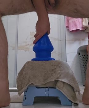 Busty babe rides a huge dildo and plays with her butt plug