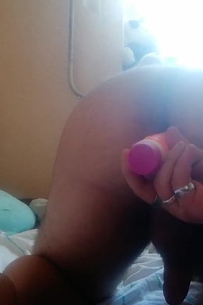 Strapon fucks herself in the ass