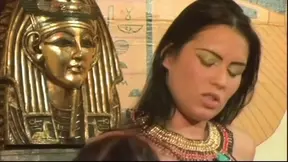 Pharaoh gets serviced by two hot sluts at his royal court