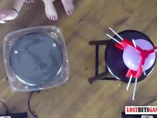 4 cuties play a game of disrobe pop the balloon