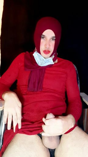 A sexy Indonesian trans woman wearing a hijab manually stimulates her penis and ejaculates profusely to please others.