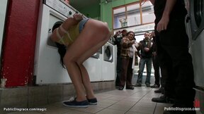 Whore humiliated in public laundromat