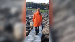 Taking a Stroll inside Orange Raincoat and Latex Boots