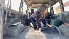 vacuuming old dirty van in leather pants 0805m4