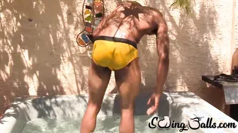 Muscular jock tugs thick cock and heavy balls in pool solo