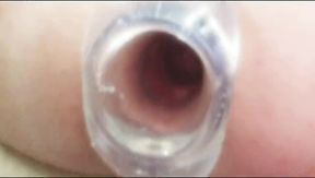 Stretched wide by the plug trans goddess shows off her gaping asshole