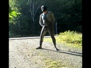 skeleton masked wetsuit on the road