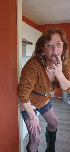 Enjoying my dildo while smoking a cigar