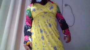 Crossdresser in a Yellow Maxi Gown