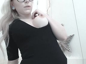 Blonde hottie doesn't even strip to play with her pussy