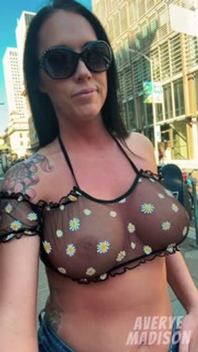 Teaser- Super HOT Brunette wearing thin see through top flashing TITS in public!