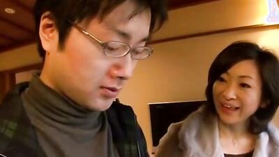 Horny Japanese MILF Saori gets a cumshot on her face after hot and heavy sex with son