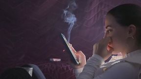 HANDY - HE'S GLAZED OVER HIS PHONE AND SMOKING A CIGARETTE.