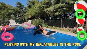 Playing with my inflatables in the pool