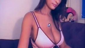 Appealing super hot mulatto chick exposes her sexy titties to the camera