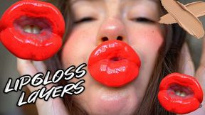 Red sticky messy lipgloss layers and pouting kisses