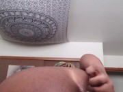 Pulling down my shorts to show my gem plug and fat chubby ass
